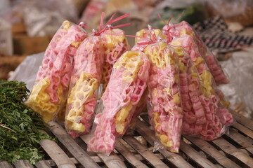 Krupuk or kerupuk   is an Indonesian deep fried crackers made from starch and other ingredients that serve as flavouring. 