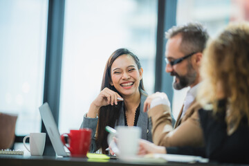 The successful friend businessman and woman is meeting and discussing for team project presentation...