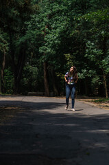 young woman enjoys the forest view