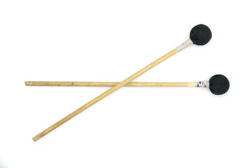 Drumsticks for playing on tongue drum, tank drum, isolated on a white background.