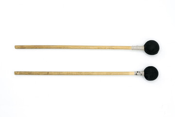 Drumsticks for playing on tongue drum, tank drum, isolated on a white background.