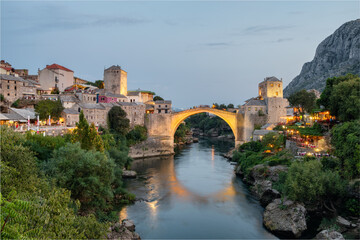 Fototapeta na wymiar Stari Most bridge at twilight in old town of Mostar, BIH