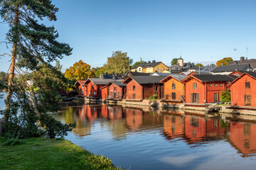 Fototapeta na wymiar Old wooden red houses in old town of Porvoo, Finland