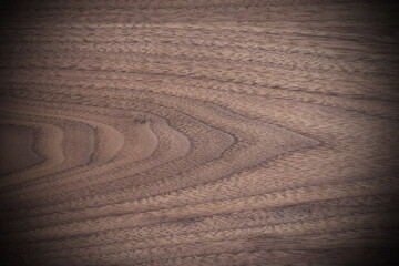 Naklejka premium Walnut Grain Background Texture with Vignette