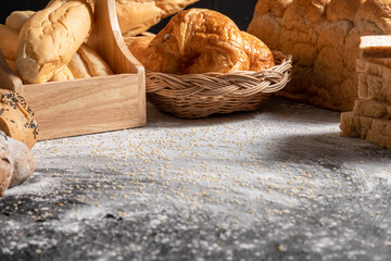 The texture of the wooden black table with sesame background