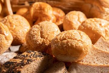 A variety of sesame buns put together on the table