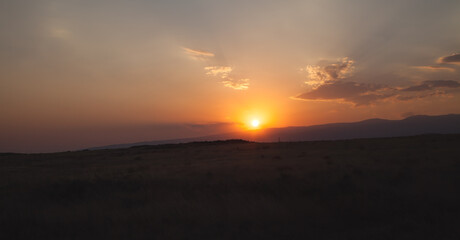 Fototapeta na wymiar Beautiful view. Sunset at field. Armenia