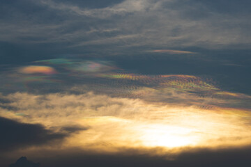 Fototapeta na wymiar View of the Iridescent clouds in the sky