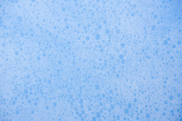 Abstract background white soapy foam texture. Shampoo foam with bubbles