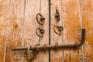 Close up of tradtional door lock on wooden door in Cartagena, Colombia