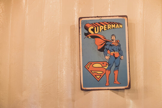NAKHON NAYOK - APRIL 23 : Poster old comic superman action sign logo hanging on the wall in the shop on April 23, 2017 in Nakhon Nayok Province, Thailand.
