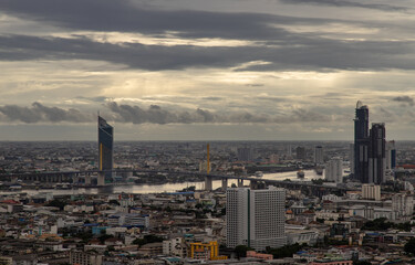 Beautiful city view of Bangkok Before the rain at sunset creates relaxing feeling for the rest of the day. Selective focus.