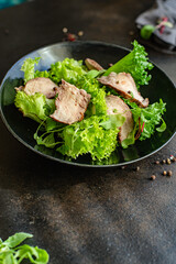 meat salad vegetables juicy veal slice on the table tasty serving size top view copy space for text keto or paleo diet food background rustic