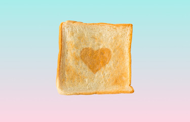 Heart shape on slice toast bread isolated on colorful background. Above view of baked bun. Top-down, Overhead cut out