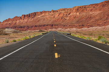 Fototapeta na wymiar American roadtrip. Empty scenic highway in Arizona, USA.