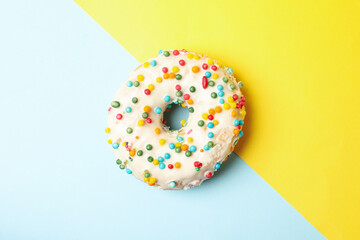 One tasty donut on two tone background
