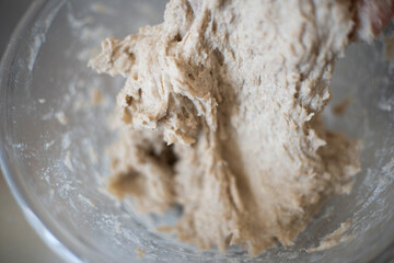 mixing water and whole wheat flour together