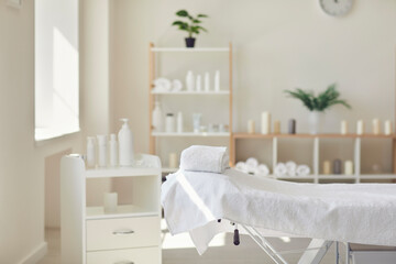 Interior of newly opened modern massage salon with all the necessary supplies ready - obrazy, fototapety, plakaty