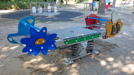 Modern colorful children playground in public park