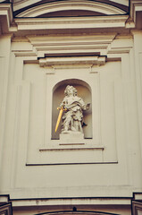 Wien, Austria - Statue in marble with gold sword in a building