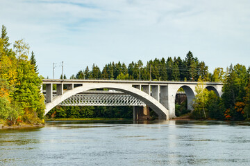 Autumn landscape of bridge and Kymijoki river waters in Finland, Kouvola, Koria