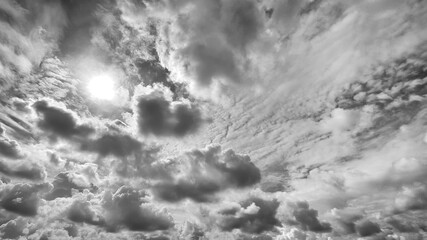 dramatic sky, sunlight shining through dark cloudy