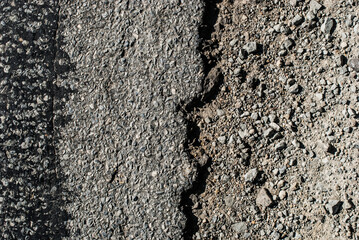 Rough road texture in full daylight. 