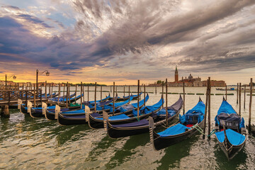 Fototapeta na wymiar Venice Italy, sunrise city skyline at Grand Canal with Gondola boat
