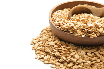 Plate with raw oatmeal on white background
