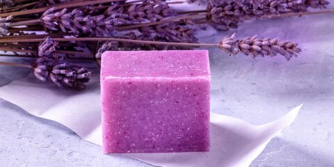 Lavender soap with dried lavender flowers panorama