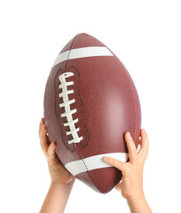 Child's hands with rugby ball on white background