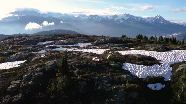 View Of Campsite In The Mountains At Sunrise