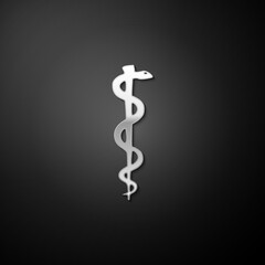 Silver Rod of asclepius snake coiled up silhouette icon isolated on black background. Emblem for drugstore or medicine, pharmacy snake symbol. Long shadow style. Vector.