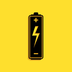 Black Battery icon isolated on yellow background. Lightning bolt symbol. Long shadow style. Vector.