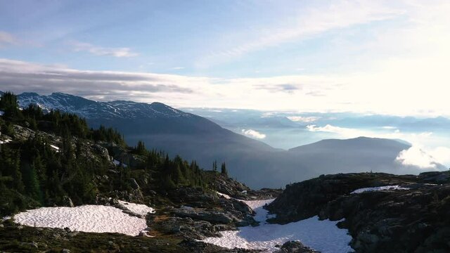 Mountain Top Landscape During A Hazy Sunrise