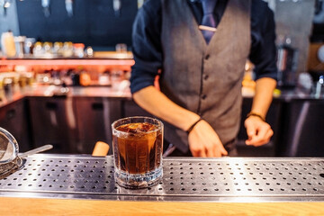 Cold Brew. For lovers of cool caffeinated drinks. Served in a transparent glass with ice. Before use, it is infused for several hours and prepared in a special installation