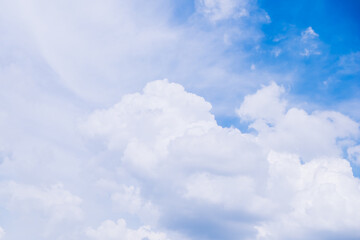 Naklejka na ściany i meble Blue sky and white cloud background.