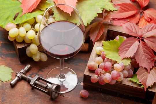 Red wine and grapes