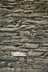 Vertical picture of decorative stone wall for background