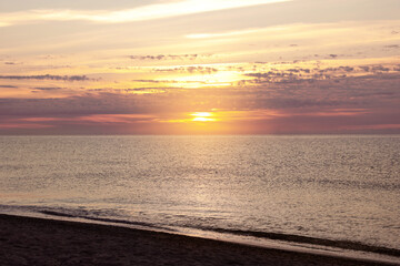 Obraz premium Picturesque view of beautiful sea at sunset. Summer vacation