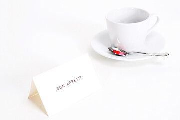 coffee cup and paper card