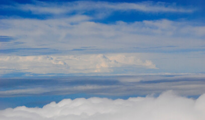 Clouds and sky from airplane window view