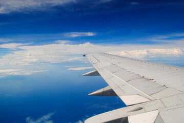 Obraz premium Clouds and sky from airplane window view