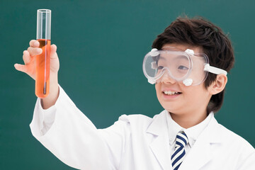 boy in front of blackboard