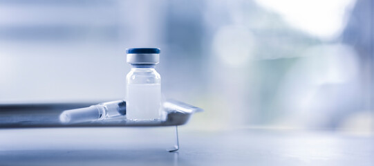 Vaccine coronavirus deverlopment vial dose flu shot drug needle syringe,medical concept vaccination hypodermic injection treatment disease care hospital prevention immunization illness disease.