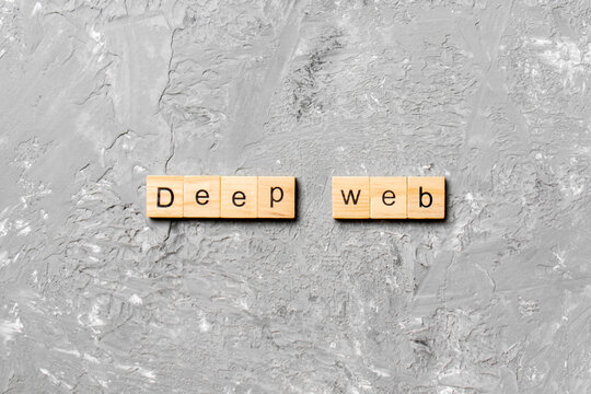 Deep web word written on wood block. Deep web text on cement table for your desing, concept