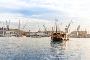 Fototapeta premium Entrance of the wooden sailing touristic ship in the bay of Trogir, Croatia