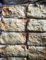 homemade pies with cottage cheese on foil