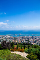 Sunny summer view of Bahai Gardens and Port in Haifa City from Louis Promenade