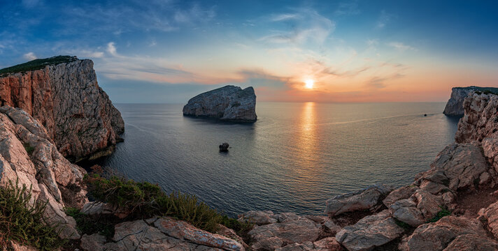 Spectacular panoramic view of Capo Caccia, in front of Foradada island at sunset, Alghero - Sassari - Sardinia - Italy